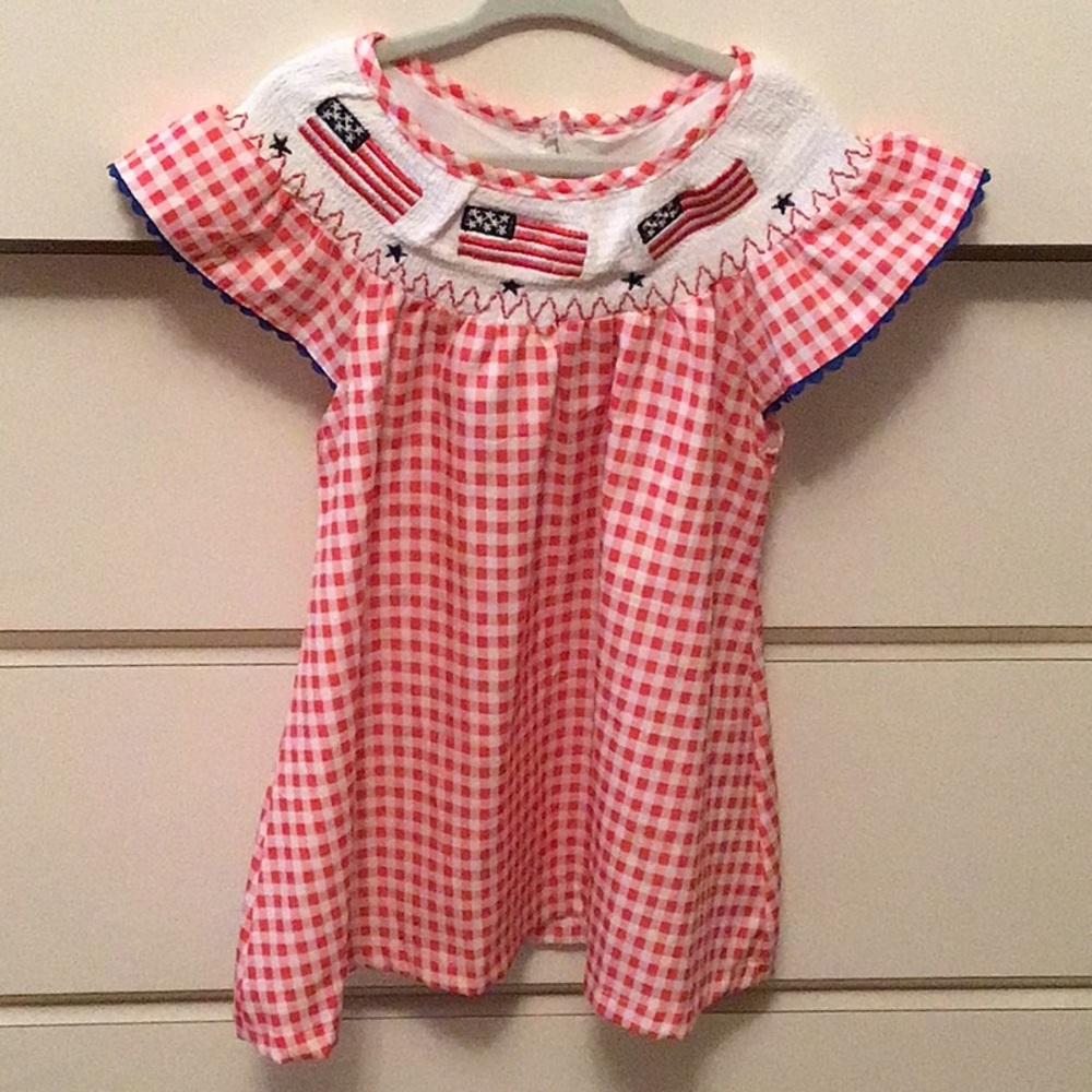 Girls red gingham smocked flag trim dress